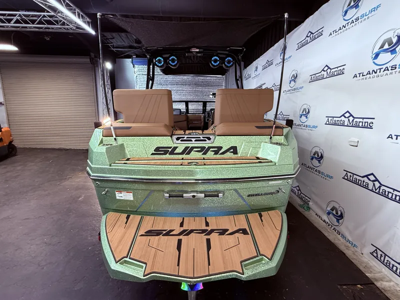 Slide: The Image of 2023 Supra SA 550 boat in showroom at Atlanta Marine. - 13