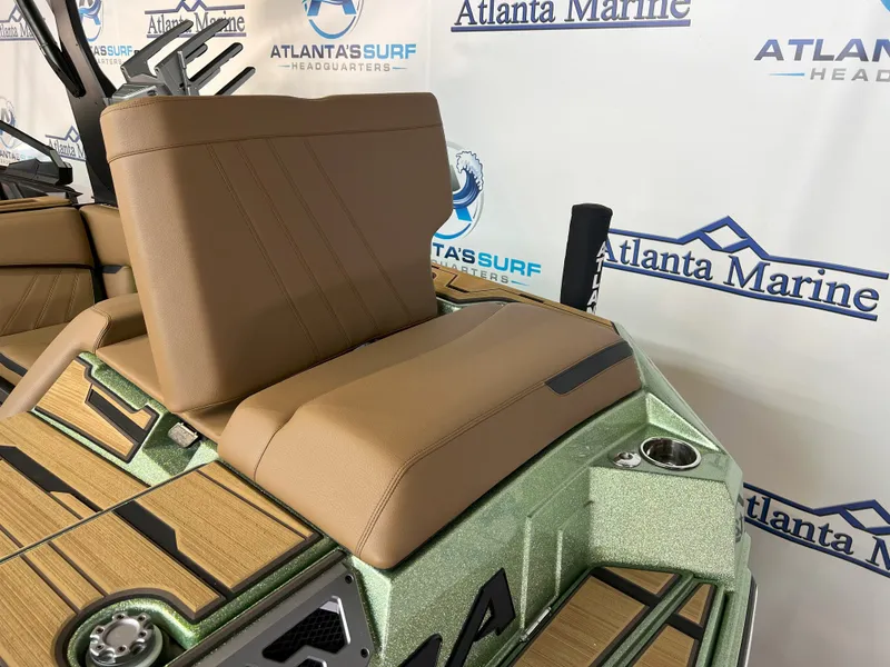 Slide: The Image of 2023 Supra SA 550 boat with brown seats and Atlanta Marine branding. - 15