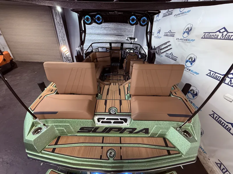 Slide: The Image of 2023 Supra SA 550 boat with luxurious interior and modern amenities. - 16