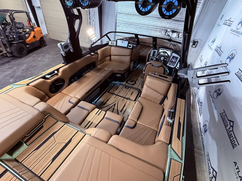 Slide: The Image of Interior of 2023 Supra SA 550 with luxurious leather seating. - 18