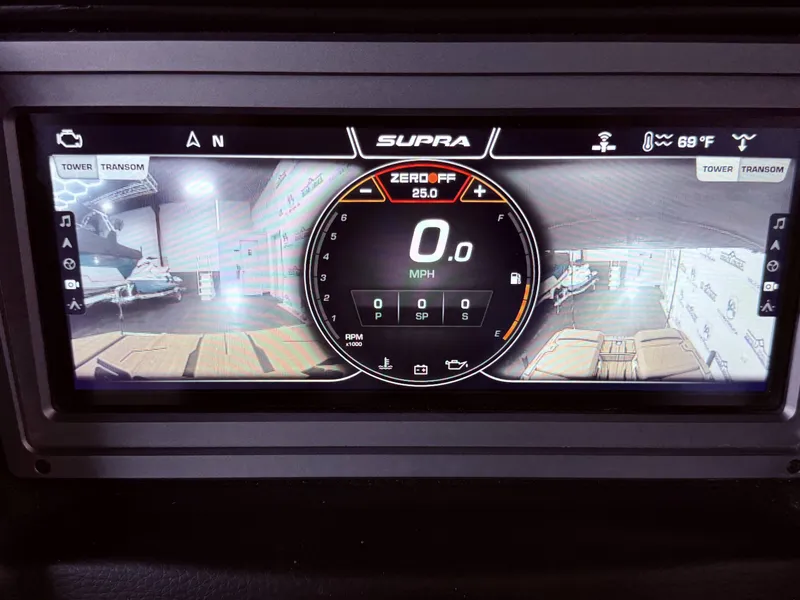 Slide: The Image of 2023 Supra SA 550 dashboard with digital speedometer and rearview camera. - 28