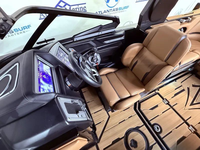 Slide: The Image of 2023 Supra SA 550 interior with modern dashboard and leather seats. - 29