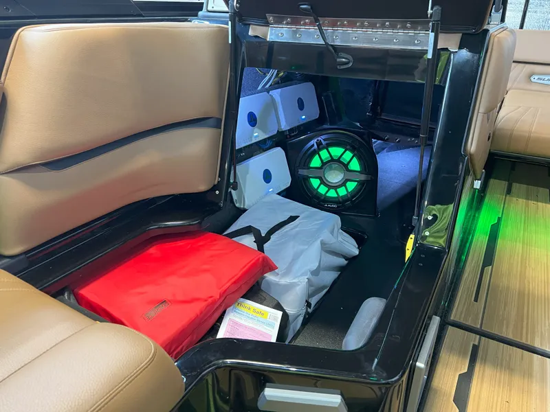 Slide: The Image of Interior of Supra SA 550 boat with speaker and storage area. - 31