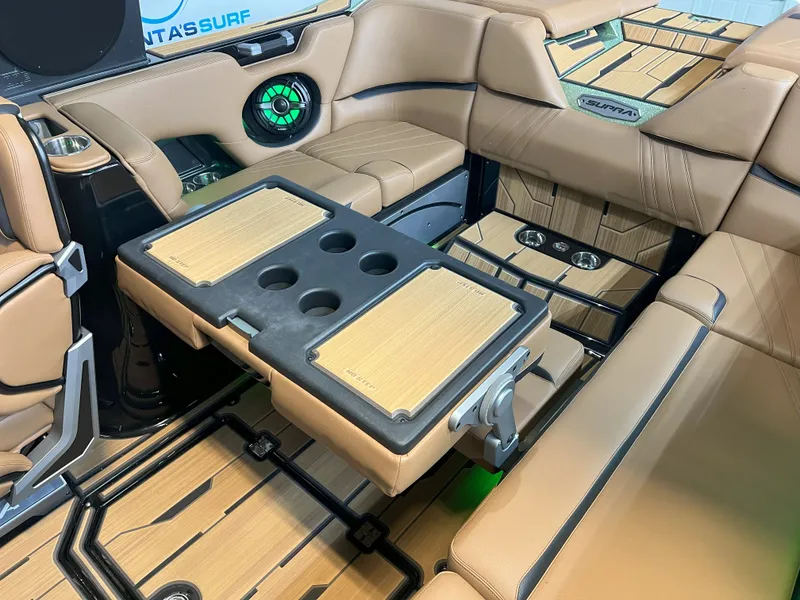 Slide: The Image of 2023 Supra SA 550 interior with luxurious seating and table. - 32