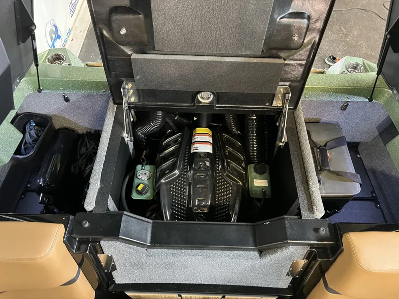 Slide: The Image of Engine compartment of 2023 Supra SA 550 boat, open for maintenance. - 36