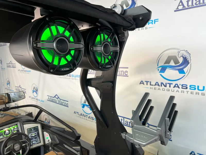 Slide: The Image of 2023 Supra SA 550 with green JL Audio speakers. - 41