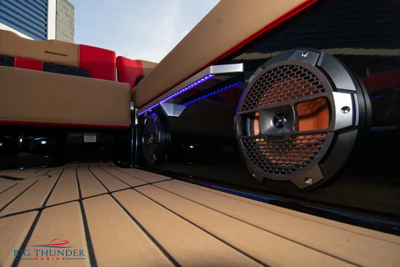 Slide: The Image of 2021 MasterCraft X24 boat interior with premium speakers and LED lighting. - 28