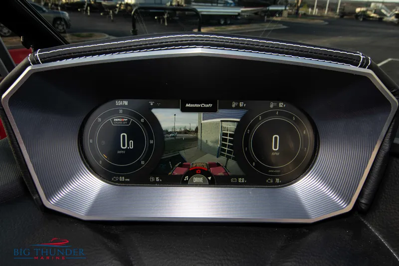 Slide: The Image of Dashboard of a 2021 MasterCraft X24 boat with digital display. - 42