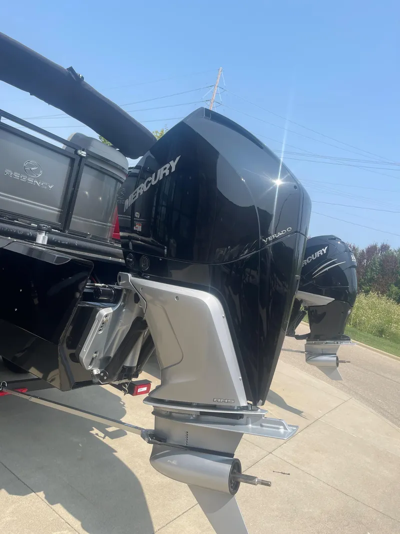 Slide: The Image of 2023 Regency 230 DL3 with Mercury outboard engines. - 3