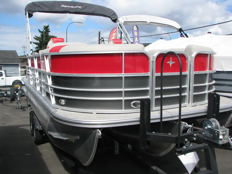 The Image of 2023 Berkshire 22RFX LE pontoon boat with red and silver exterior. - 0
