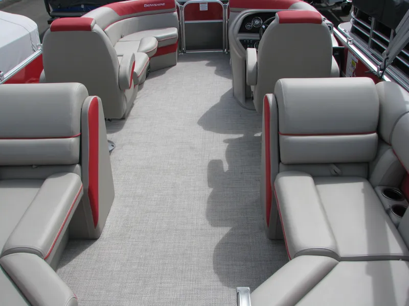 Slide: The Image of 2023 Berkshire 22RFX LE pontoon boat interior with gray and red seating. - 6
