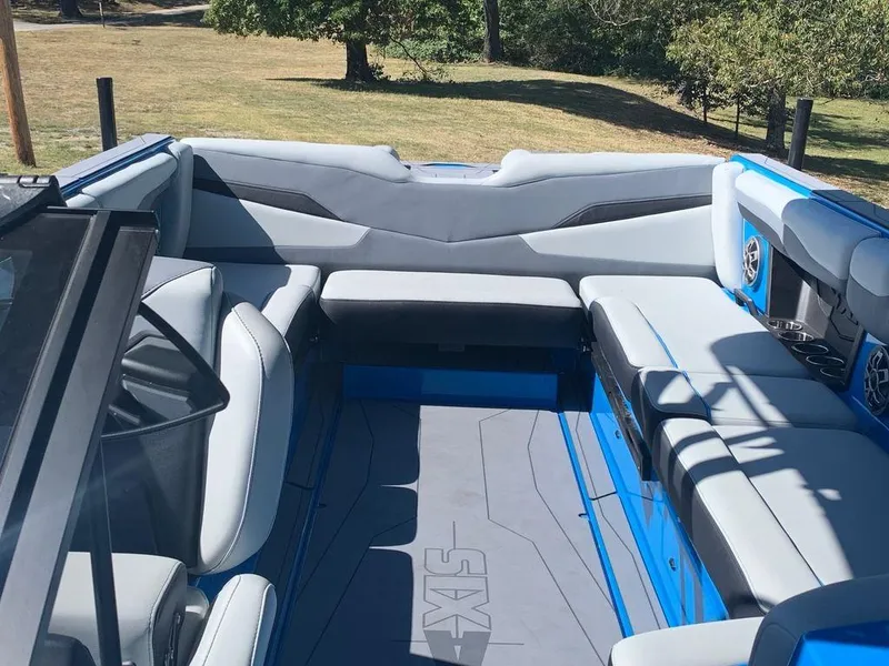 Slide: The Image of 2023 Axis T250 boat interior with spacious seating and modern design. - 2