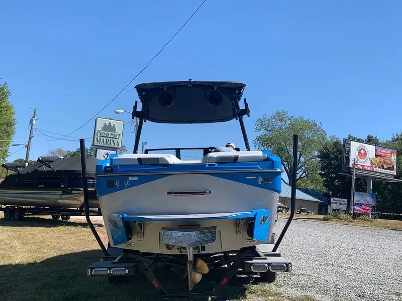 Slide: The Image of 2023 Axis T250 boat at Cedar Creek Marina, rear view. - 3
