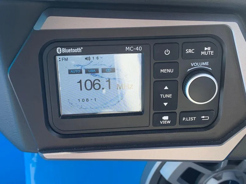 Slide: The Image of Axis T250 2023 model radio display showing 106.1 MHz FM frequency. - 4