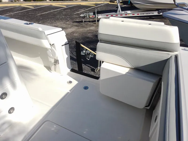 Slide: The Image of 2024 Regulator 31 boat interior with white seating and deck. - 18