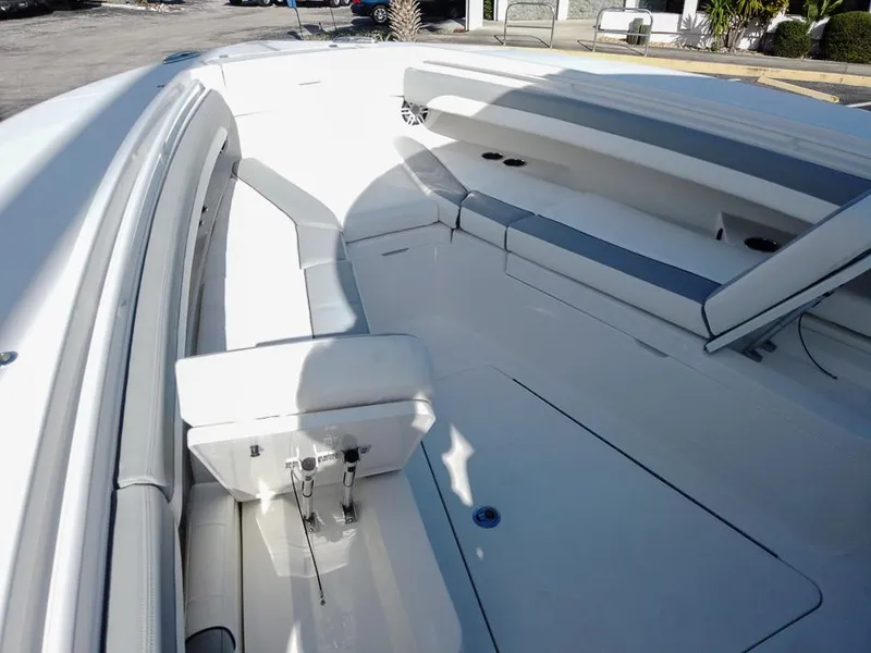 Slide: The Image of 2024 Regulator 31 boat interior with white and gray seating. - 24