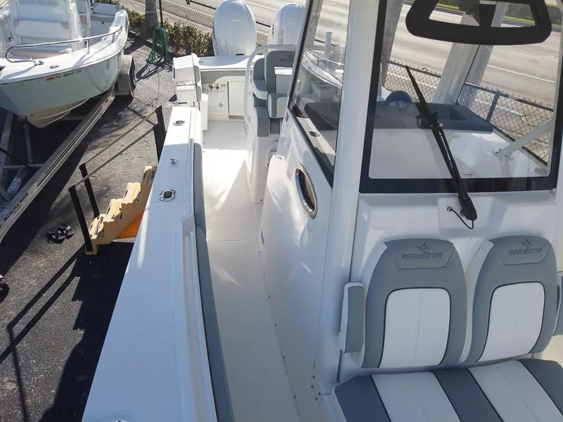 Slide: The Image of 2024 Regulator 31 boat interior with seating and console. - 28