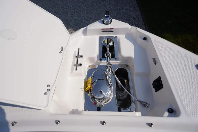 Slide: The Image of 2025 Chaparral 267 SSX boat interior with spacious seating and modern design. - 17