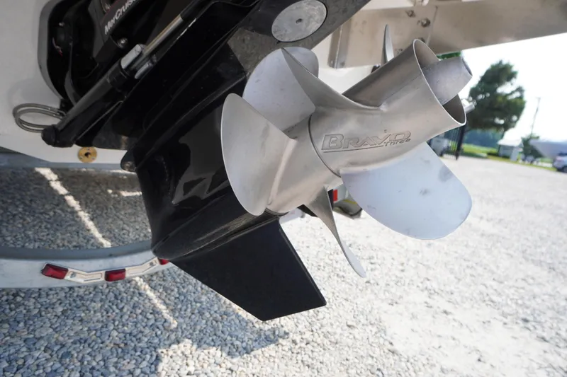 Slide: The Image of Close-up of 2025 Chaparral 267 SSX boat emblem on white surface. - 9