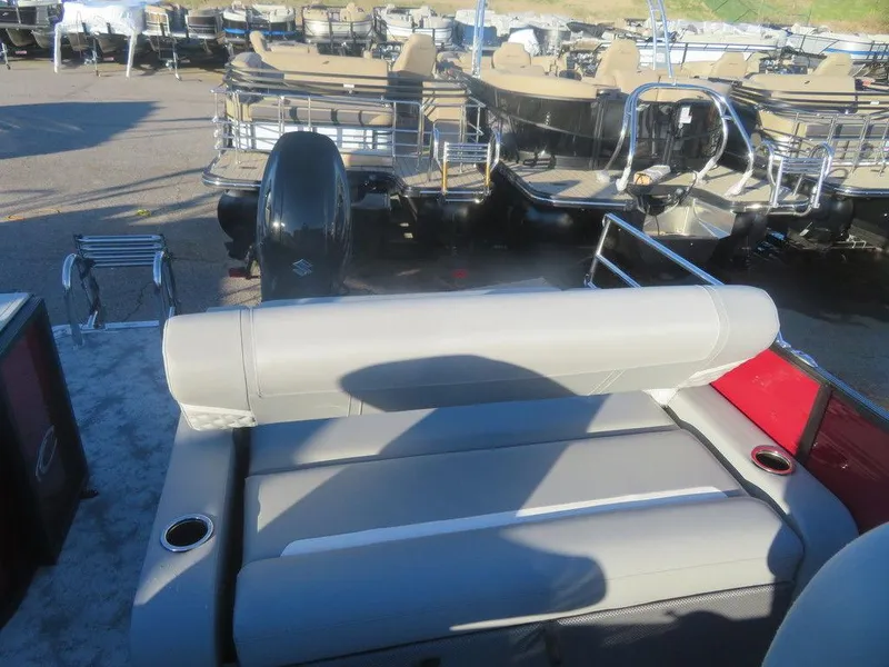 Slide: The Image of 2023 Crest Classic DLX 220 SLSC CPT DLX pontoon boat with gray seating. - 13