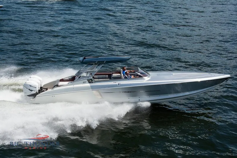 The Image of 2019 Donzi 41 GT speedboat cruising on water. - 0