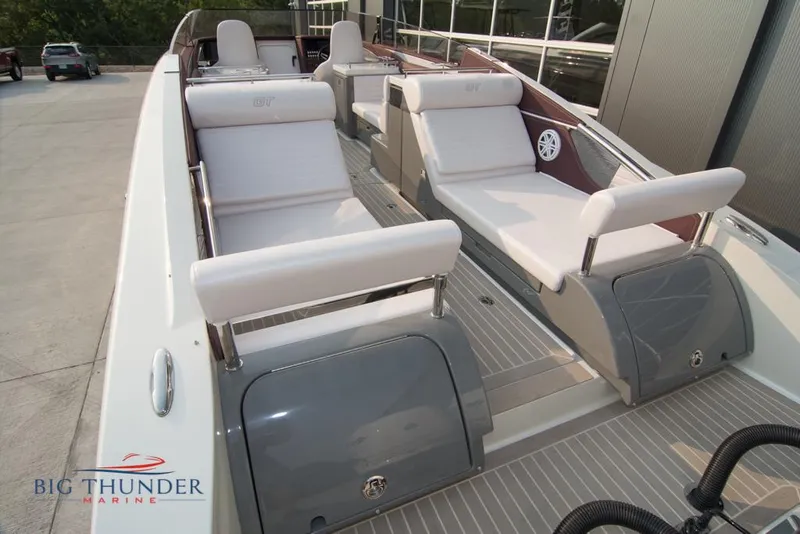 Slide: The Image of 2019 Donzi 41 GT boat interior with white seating at Big Thunder Marine. - 19