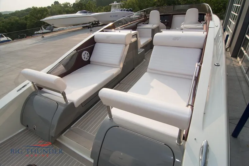 Slide: The Image of 2019 Donzi 41 GT luxury boat with white seating and modern design. - 20