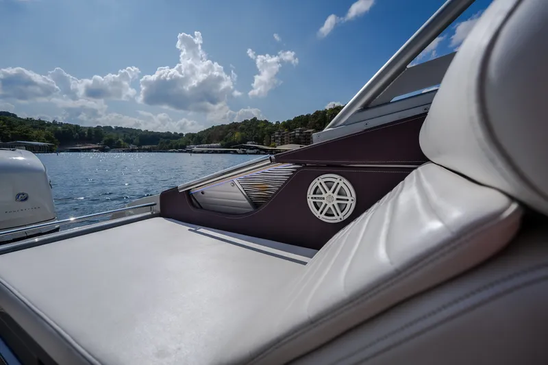 Slide: The Image of 2019 Donzi 41 GT boat interior with luxurious seating and scenic lake view. - 19