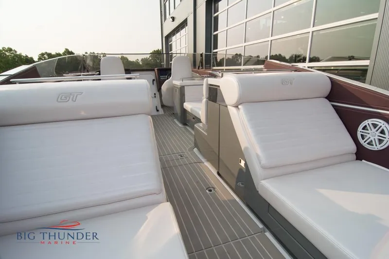 Slide: The Image of 2019 Donzi 41 GT boat interior with white seating at Big Thunder Marine. - 25