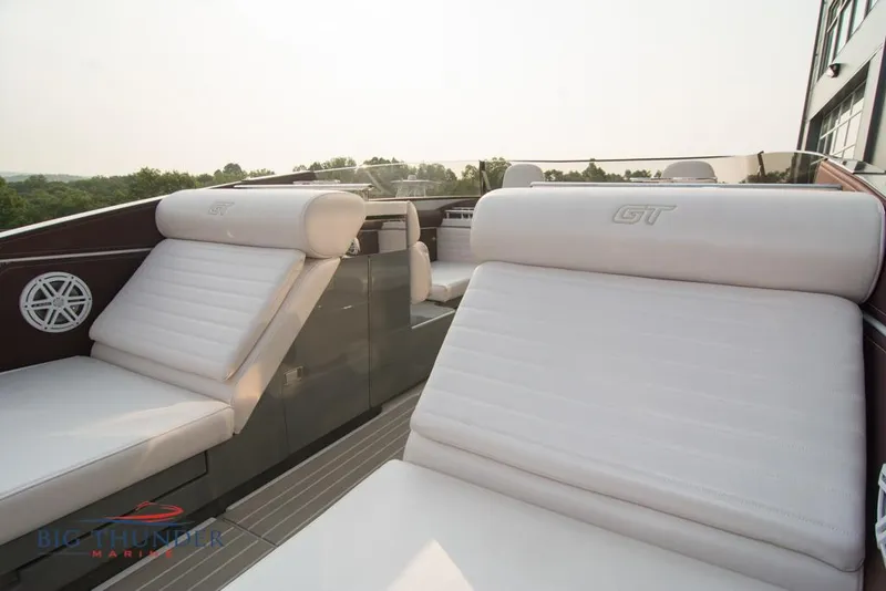 Slide: The Image of 2019 Donzi 41 GT boat with luxurious white seating at Big Thunder Marine. - 26