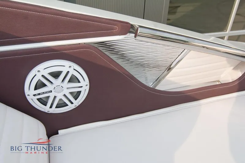 Slide: The Image of 2019 Donzi 41 GT boat interior with speaker, white and brown upholstery, Big Thunder Marine logo. - 29