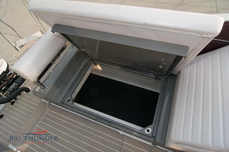 Slide: The Image of 2019 Donzi 41 GT storage compartment with open hatch. - 32