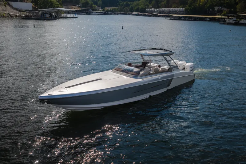 Slide: The Image of 2019 Donzi 41 GT boat cruising on a sunny lake. - 11