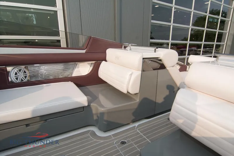 Slide: The Image of Interior seating of a 2019 Donzi 41 GT boat with white and maroon upholstery. - 34