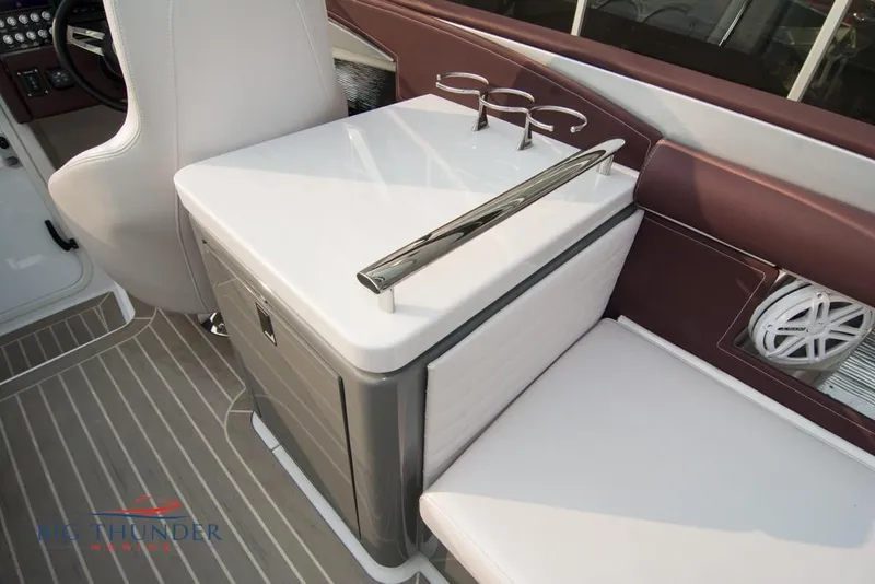 Slide: The Image of 2019 Donzi 41 GT boat interior with seating and storage. - 46