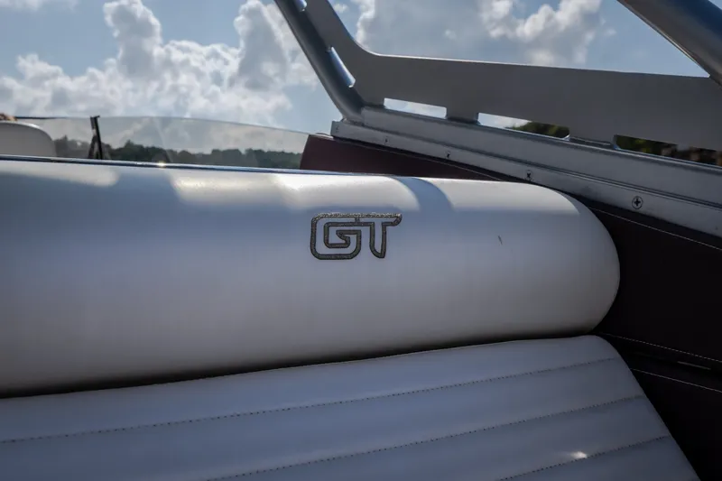 Slide: The Image of Interior of 2019 Donzi 41 GT boat with GT logo on white upholstery. - 14
