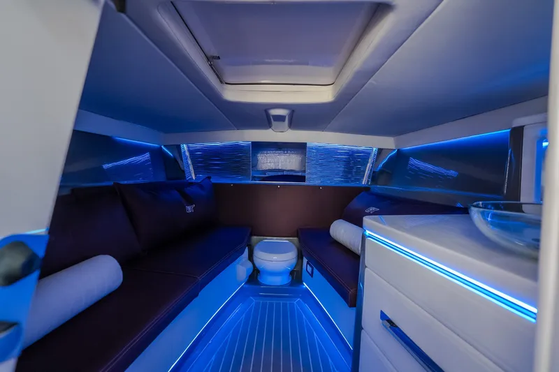 Slide: The Image of Interior of 2019 Donzi 41 GT boat with modern blue LED lighting. - 53