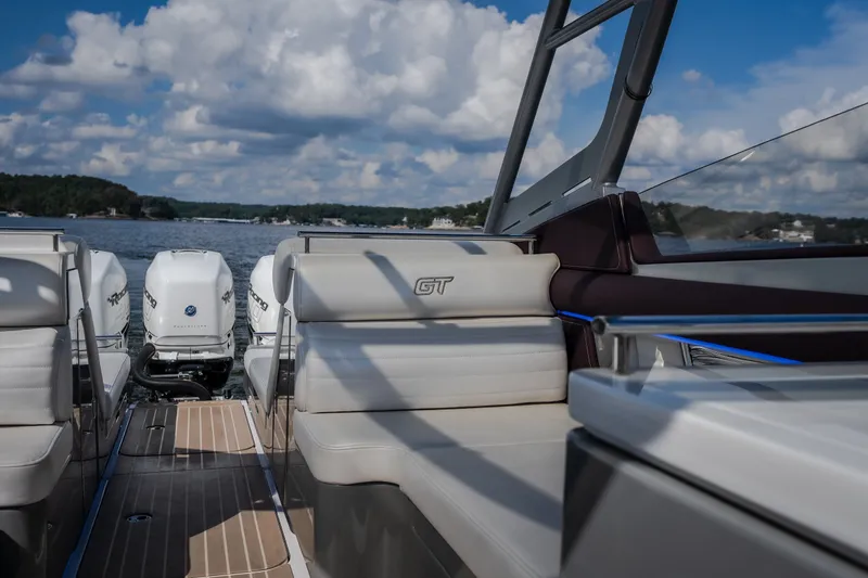 Slide: The Image of 2019 Donzi 41 GT boat interior with luxurious seating and powerful outboard engines. - 27