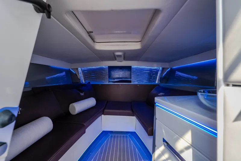 Slide: The Image of Luxurious interior of 2019 Donzi 41 GT boat with modern seating and ambient lighting. - 55