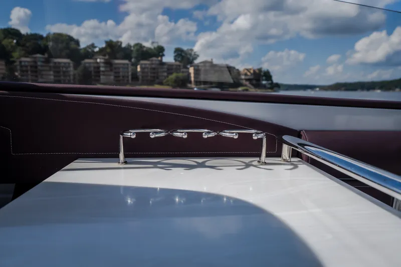Slide: The Image of Interior view of 2019 Donzi 41 GT boat with sleek design and scenic water backdrop. - 30
