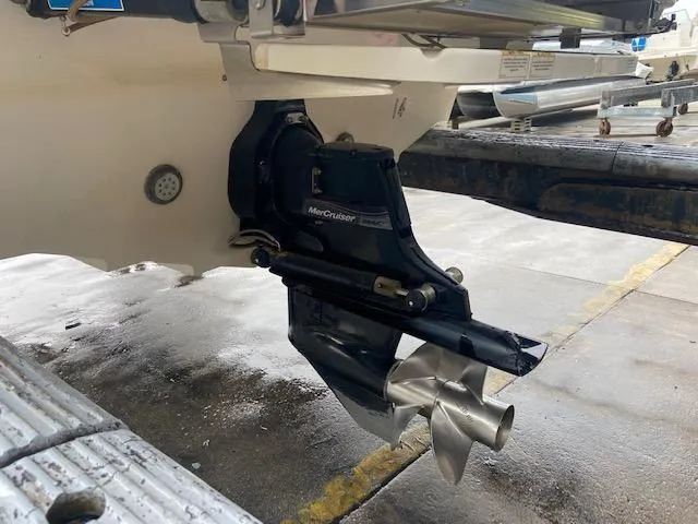 Slide: The Image of 2017 Sea Ray 250 SLX boat with MerCruiser outdrive in a marina. - 12