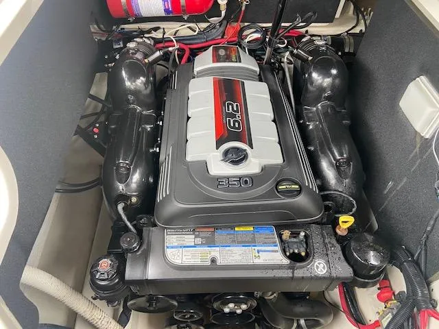 Slide: The Image of 2017 Sea Ray 250 SLX boat engine compartment with 6.2L 350 HP engine. - 19