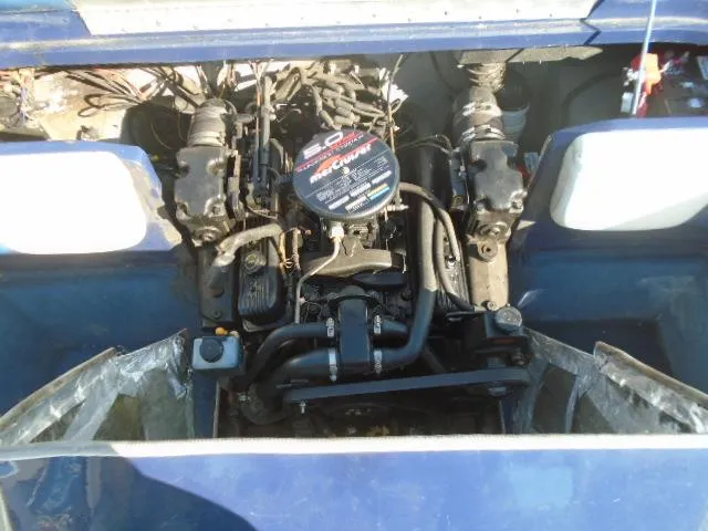 Slide: The Image of 1998 Tahoe Q5L I/O boat engine compartment with MerCruiser 5.0L engine. - 13