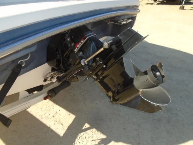 Slide: The Image of 1998 Tahoe Q5L I/O boat stern drive and propeller. - 15