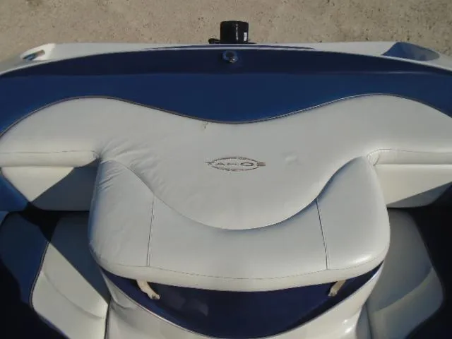 Slide: The Image of 1998 Tahoe Q5L I/O boat interior with white and blue seating. - 17