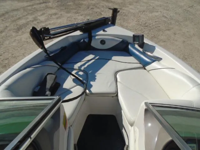 Slide: The Image of 1998 Tahoe Q5L I/O boat interior with seating and equipment. - 4