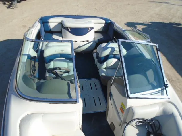 Slide: The Image of 1998 Tahoe Q5L I/O boat interior with seating and windshield. - 5