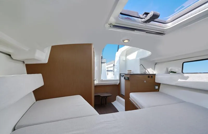 Slide: The Image of Interior cabin of 2024 Jeanneau Leader 7.5 WA S3 with modern furnishings and skylight. - 6