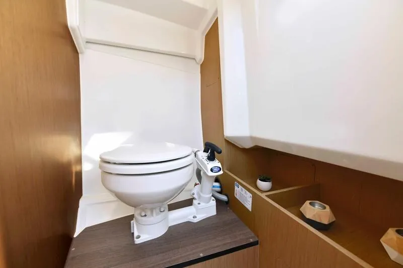 Slide: The Image of 2024 Jeanneau Leader 7.5 WA S3 boat interior bathroom with toilet. - 9
