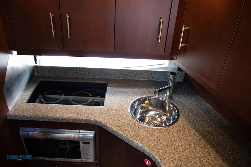 Slide: The Image of Galley Range, Sink, and Microwave - 48